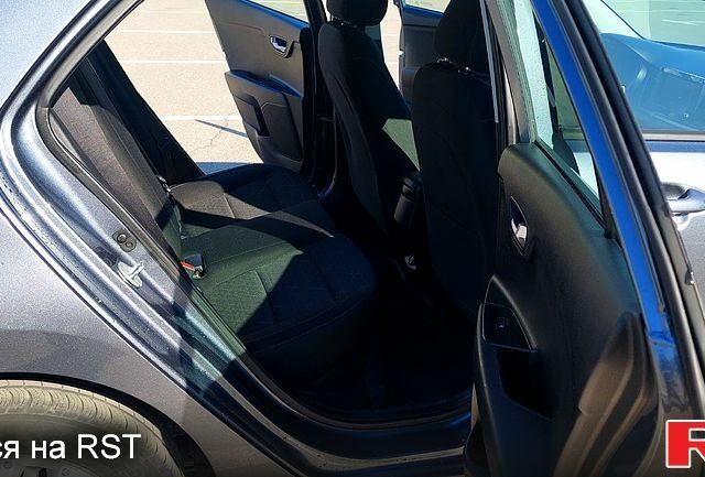 Серый Киа Рио, объемом двигателя 1.6 л и пробегом 171 тыс. км за 11700 $, фото 11 на Automoto.ua