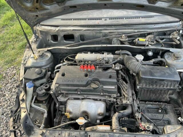 Сірий Кіа Ріо, об'ємом двигуна 1 л та пробігом 137 тис. км за 1200 $, фото 2 на Automoto.ua