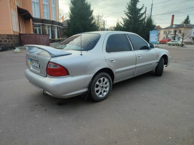 Серый Киа Рио, объемом двигателя 1.8 л и пробегом 250 тыс. км за 1350 $, фото 2 на Automoto.ua