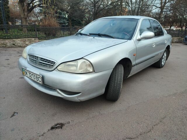 Серый Киа Рио, объемом двигателя 1.8 л и пробегом 250 тыс. км за 1350 $, фото 1 на Automoto.ua