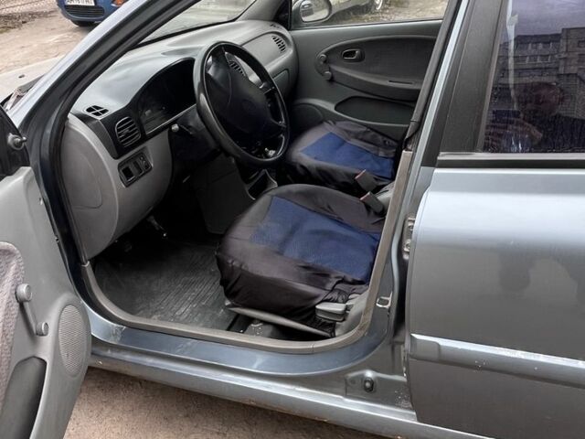 Серый Киа Рио, объемом двигателя 1.3 л и пробегом 352 тыс. км за 1900 $, фото 4 на Automoto.ua