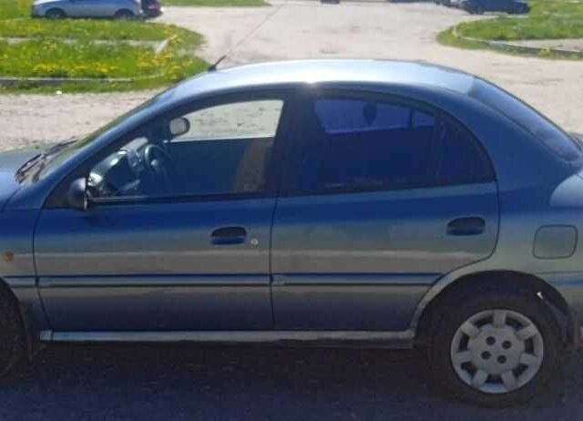 Серый Киа Рио, объемом двигателя 1.3 л и пробегом 330 тыс. км за 1500 $, фото 1 на Automoto.ua