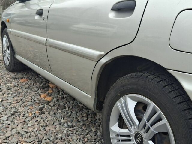 Серый Киа Рио, объемом двигателя 1.3 л и пробегом 230 тыс. км за 2750 $, фото 11 на Automoto.ua