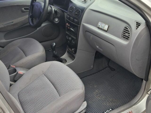 Серый Киа Рио, объемом двигателя 1.3 л и пробегом 230 тыс. км за 2750 $, фото 13 на Automoto.ua