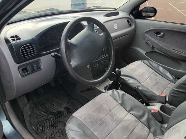 Серый Киа Рио, объемом двигателя 1.3 л и пробегом 190 тыс. км за 1750 $, фото 2 на Automoto.ua