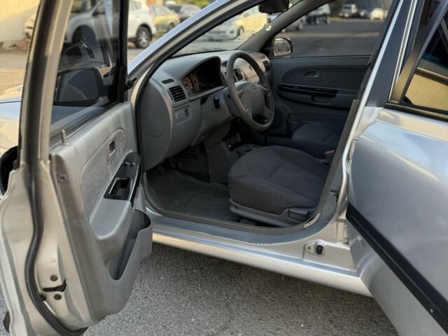 Сірий Кіа Ріо, об'ємом двигуна 1.3 л та пробігом 154 тис. км за 2600 $, фото 5 на Automoto.ua