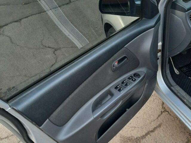 Сірий Кіа Ріо, об'ємом двигуна 1.4 л та пробігом 177 тис. км за 5400 $, фото 10 на Automoto.ua