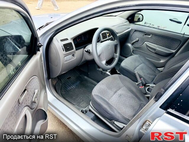 Серый Киа Рио, объемом двигателя 1.4 л и пробегом 300 тыс. км за 2300 $, фото 10 на Automoto.ua