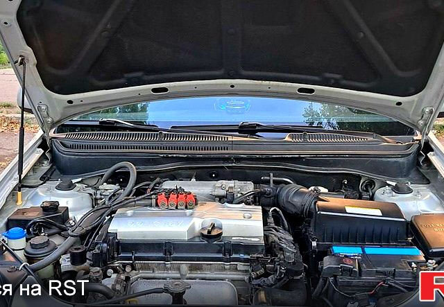 Серый Киа Рио, объемом двигателя 1.4 л и пробегом 85 тыс. км за 4400 $, фото 10 на Automoto.ua