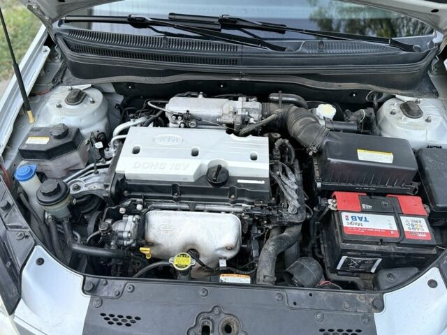 Серый Киа Рио, объемом двигателя 1.4 л и пробегом 198 тыс. км за 3900 $, фото 12 на Automoto.ua