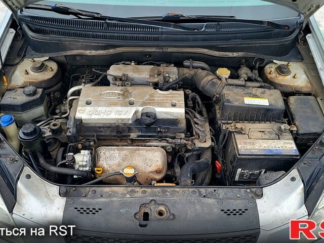 Серый Киа Рио, объемом двигателя 1.4 л и пробегом 24400 тыс. км за 4500 $, фото 12 на Automoto.ua