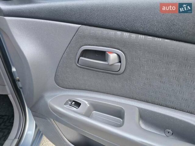 Серый Киа Рио, объемом двигателя 1.4 л и пробегом 153 тыс. км за 5499 $, фото 39 на Automoto.ua