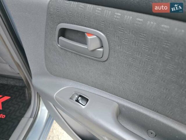 Серый Киа Рио, объемом двигателя 1.4 л и пробегом 153 тыс. км за 5499 $, фото 44 на Automoto.ua