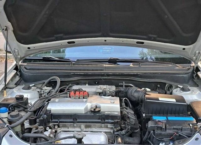Серый Киа Рио, объемом двигателя 1.4 л и пробегом 85 тыс. км за 4400 $, фото 12 на Automoto.ua