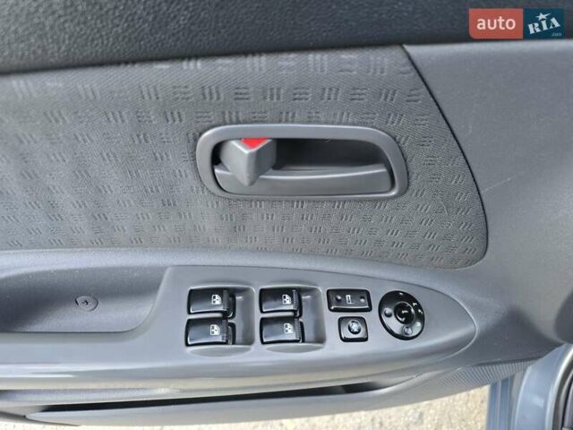 Серый Киа Рио, объемом двигателя 1.4 л и пробегом 153 тыс. км за 5499 $, фото 15 на Automoto.ua