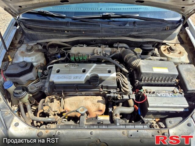 Серый Киа Рио, объемом двигателя 1.4 л и пробегом 180 тыс. км за 4500 $, фото 12 на Automoto.ua
