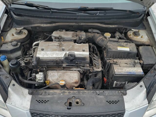 Серый Киа Рио, объемом двигателя 1.4 л и пробегом 244 тыс. км за 4500 $, фото 20 на Automoto.ua