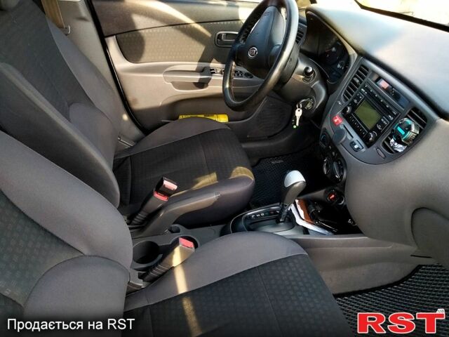 Сірий Кіа Ріо, об'ємом двигуна 1.4 л та пробігом 230 тис. км за 5200 $, фото 5 на Automoto.ua