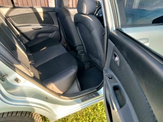 Сірий Кіа Ріо, об'ємом двигуна 1.4 л та пробігом 230 тис. км за 5200 $, фото 3 на Automoto.ua