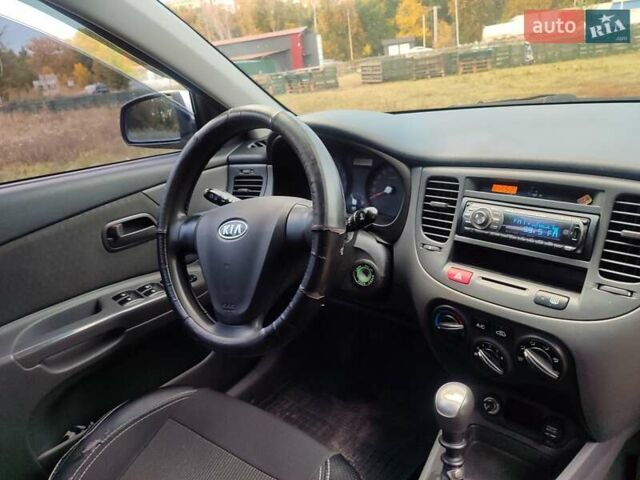 Серый Киа Рио, объемом двигателя 1.4 л и пробегом 176 тыс. км за 4600 $, фото 22 на Automoto.ua