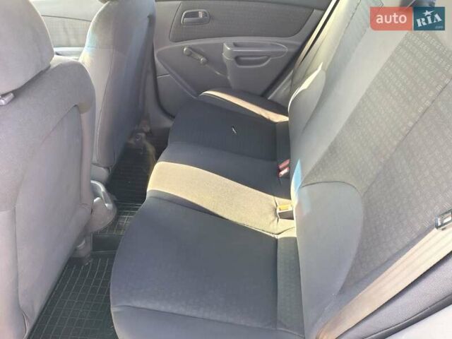 Серый Киа Рио, объемом двигателя 1.4 л и пробегом 236 тыс. км за 3300 $, фото 17 на Automoto.ua