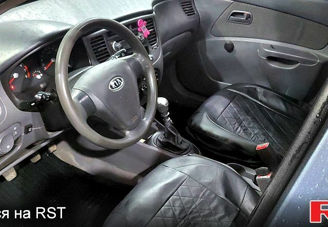 Серый Киа Рио, объемом двигателя 1.4 л и пробегом 198 тыс. км за 3950 $, фото 7 на Automoto.ua