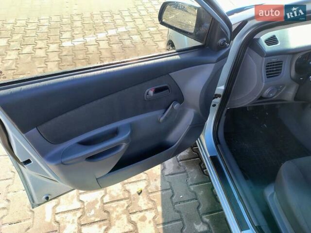 Серый Киа Рио, объемом двигателя 1.4 л и пробегом 236 тыс. км за 3300 $, фото 12 на Automoto.ua