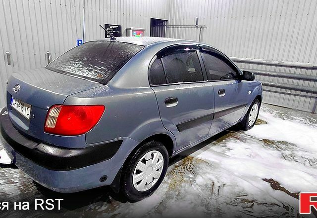 Серый Киа Рио, объемом двигателя 1.4 л и пробегом 198 тыс. км за 3950 $, фото 2 на Automoto.ua