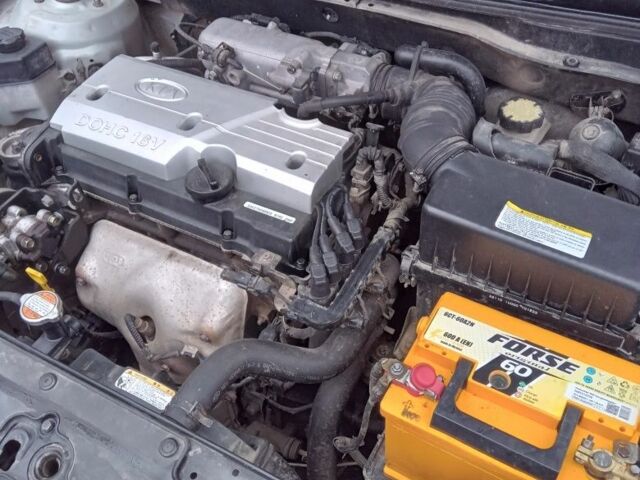 Серый Киа Рио, объемом двигателя 1.4 л и пробегом 247 тыс. км за 3700 $, фото 4 на Automoto.ua