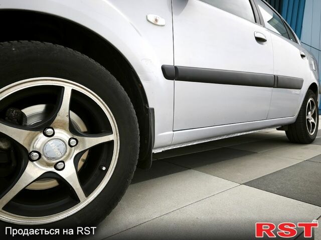 Серый Киа Рио, объемом двигателя 1.4 л и пробегом 220 тыс. км за 4500 $, фото 2 на Automoto.ua