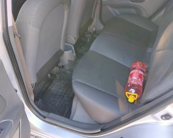 Серый Киа Рио, объемом двигателя 1.4 л и пробегом 240 тыс. км за 4100 $, фото 2 на Automoto.ua