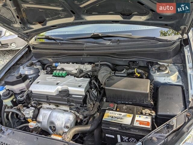 Серый Киа Рио, объемом двигателя 1.4 л и пробегом 169 тыс. км за 4500 $, фото 7 на Automoto.ua