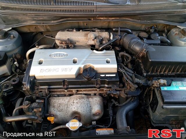 Сірий Кіа Ріо, об'ємом двигуна 1.4 л та пробігом 197 тис. км за 3150 $, фото 4 на Automoto.ua