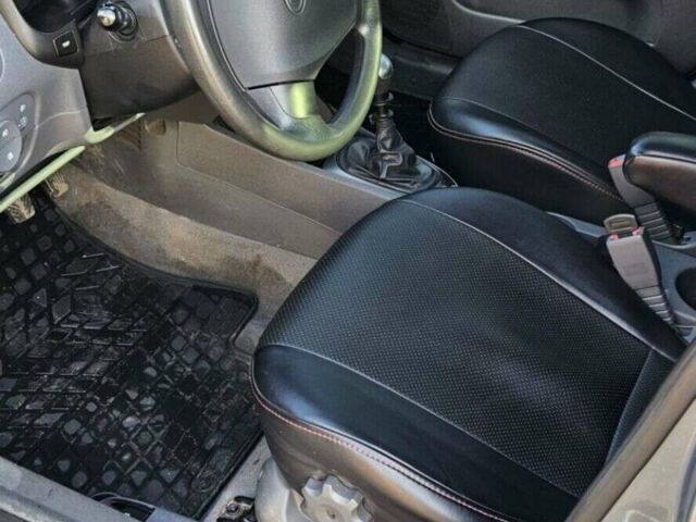Серый Киа Рио, объемом двигателя 1.4 л и пробегом 182 тыс. км за 5200 $, фото 3 на Automoto.ua