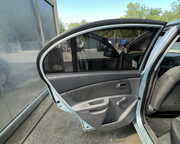 Серый Киа Рио, объемом двигателя 1.4 л и пробегом 177 тыс. км за 4400 $, фото 12 на Automoto.ua