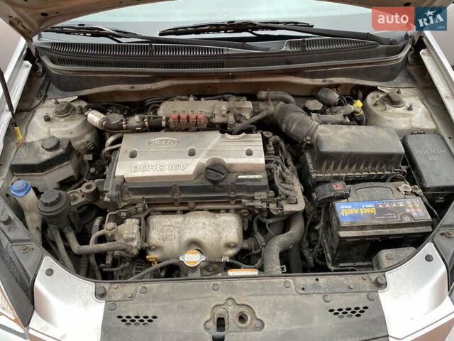 Серый Киа Рио, объемом двигателя 1.4 л и пробегом 179 тыс. км за 3999 $, фото 26 на Automoto.ua