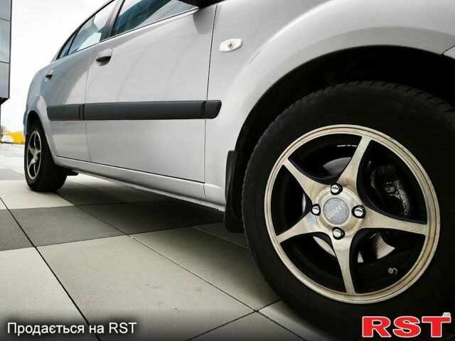 Серый Киа Рио, объемом двигателя 1.4 л и пробегом 220 тыс. км за 4500 $, фото 3 на Automoto.ua