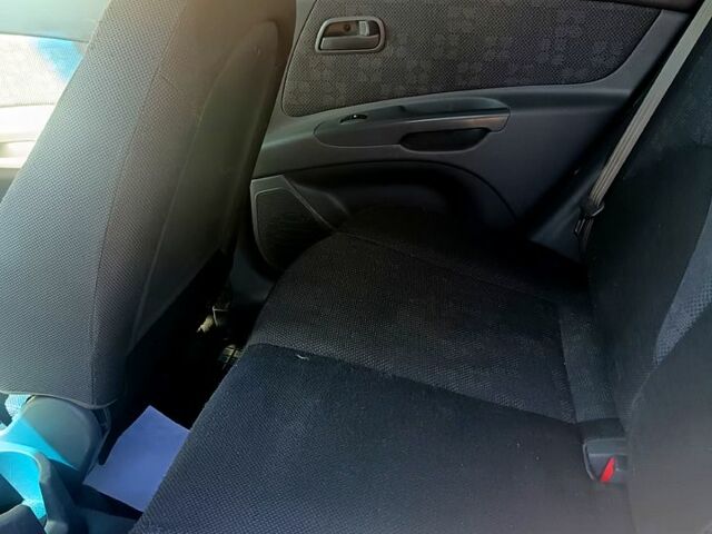 Сірий Кіа Ріо, об'ємом двигуна 1.4 л та пробігом 207 тис. км за 4100 $, фото 5 на Automoto.ua