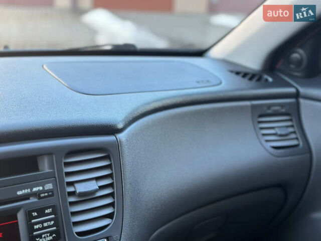 Серый Киа Рио, объемом двигателя 1.4 л и пробегом 227 тыс. км за 6750 $, фото 56 на Automoto.ua