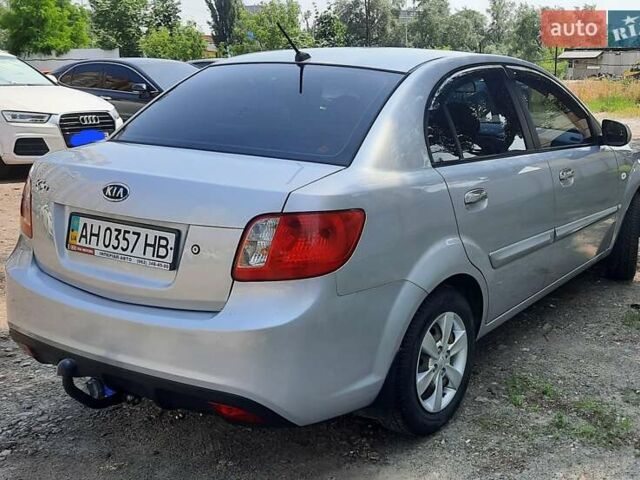 Сірий Кіа Ріо, об'ємом двигуна 1.4 л та пробігом 96 тис. км за 7292 $, фото 1 на Automoto.ua