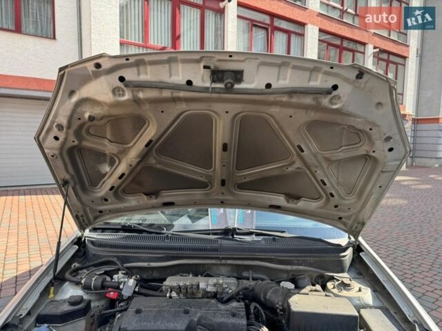 Серый Киа Рио, объемом двигателя 1.4 л и пробегом 227 тыс. км за 6850 $, фото 15 на Automoto.ua