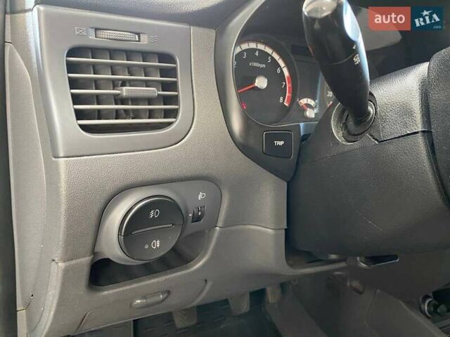 Серый Киа Рио, объемом двигателя 1.4 л и пробегом 98 тыс. км за 5990 $, фото 18 на Automoto.ua