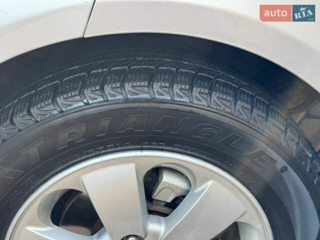 Серый Киа Рио, объемом двигателя 1.4 л и пробегом 227 тыс. км за 6850 $, фото 112 на Automoto.ua