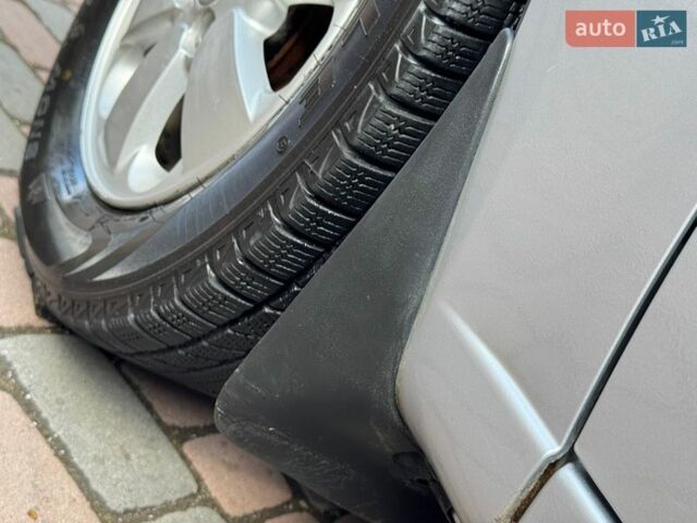 Серый Киа Рио, объемом двигателя 1.4 л и пробегом 227 тыс. км за 6850 $, фото 127 на Automoto.ua