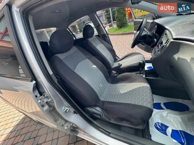Серый Киа Рио, объемом двигателя 1.4 л и пробегом 227 тыс. км за 6750 $, фото 47 на Automoto.ua
