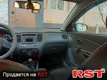 Серый Киа Рио, объемом двигателя 1.4 л и пробегом 68 тыс. км за 6600 $, фото 2 на Automoto.ua