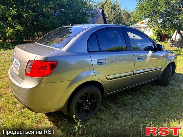 Серый Киа Рио, объемом двигателя 1.4 л и пробегом 167 тыс. км за 5400 $, фото 2 на Automoto.ua