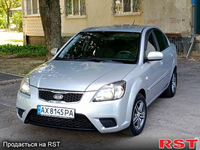 Сірий Кіа Ріо, об'ємом двигуна 1.4 л та пробігом 154 тис. км за 5500 $, фото 1 на Automoto.ua