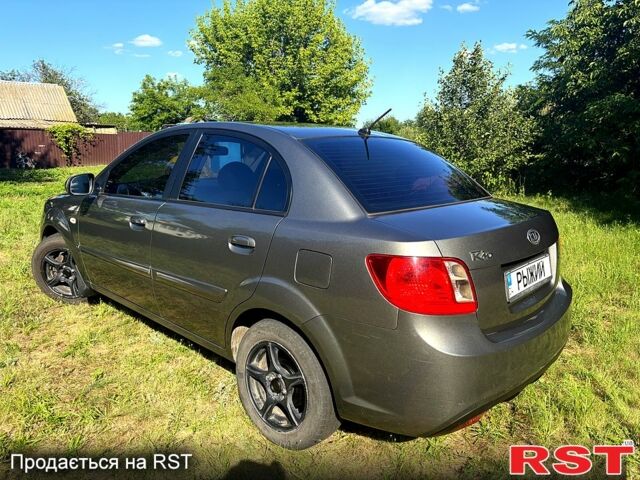 Серый Киа Рио, объемом двигателя 1.4 л и пробегом 167 тыс. км за 5400 $, фото 3 на Automoto.ua