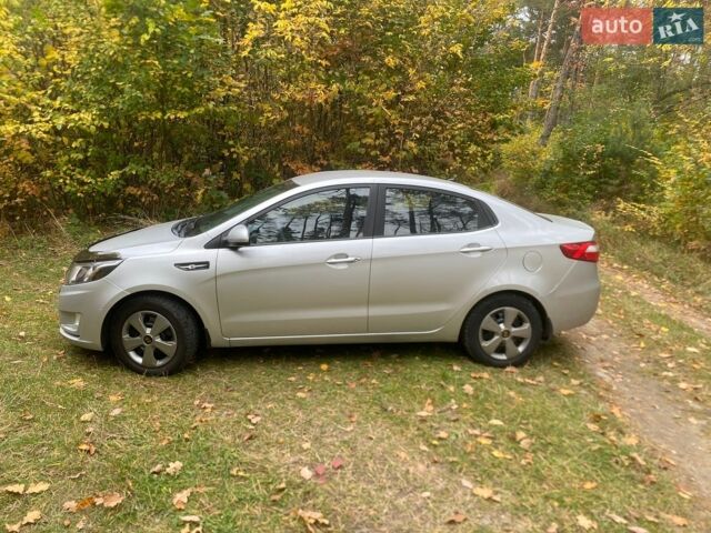 Серый Киа Рио, объемом двигателя 1.4 л и пробегом 224 тыс. км за 5400 $, фото 1 на Automoto.ua